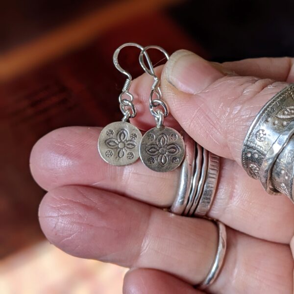 E102 Darcy Earrings. Silver disc with sand dollar design stamped and oxidised. Small earrings, dangle drop. fair trade, handmade