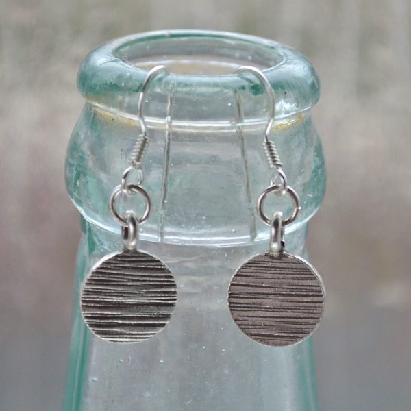Hannah Earrings, disc earrng, round earrings, Fair trade, Fairly Traded, Fairly Traded Earrings, Earrings, slow fashion, ethical fashion, boho fashion, unusual jewellery, silver, fine silver, silver earrings, elegant earrings, handmade earrings, handmade silver, handcrafted, stamped silver, oxidised silver, jewellery, jewelry, women, jewellery for women, ethical jewellery, hill tribe silver, Karen jewellery, Karen jewelery, boho chic, bohemian fashion, free spirit jewellery, accessories, Ethical, Ethically made, Ethical fashion, ethical jewelry, tribal, tribal earrings, ethnic jewellery, ethnic jewelry