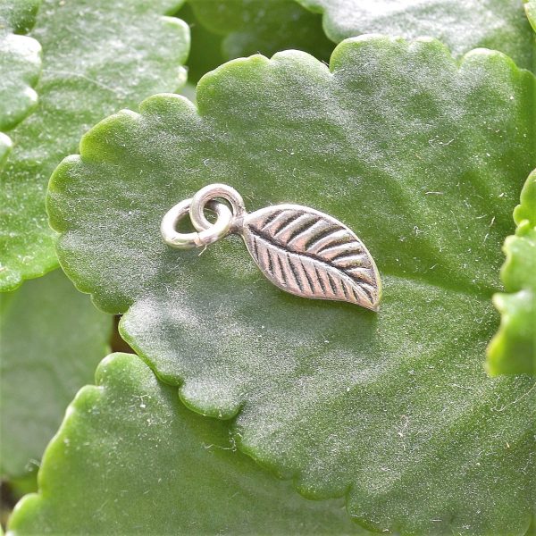 P110 Dakota Leaf Pendant. Leaf shaped fine silver pendant. small, handmade, inspired by nature. Fair Trade.