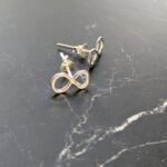 SE024 Selene Infinity Studs. Handmade in Cheshire, UK from sterling silver.