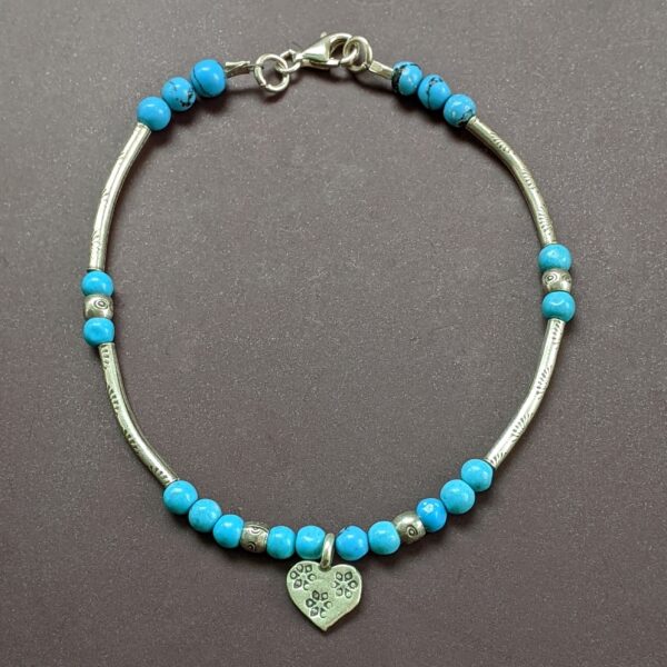 Zola Charm Bracelet with recycled silver and blue turquoise beads.