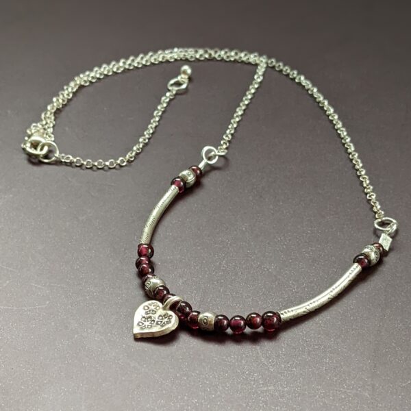 Zola Heart Necklace with gemstones. Recycled silver and red garnet beads