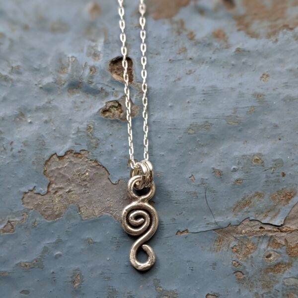P206 Adele Pendant. Spiral silver pendant. Team with a recycled silver chain or cord necklace. Fair Trade. Handmade