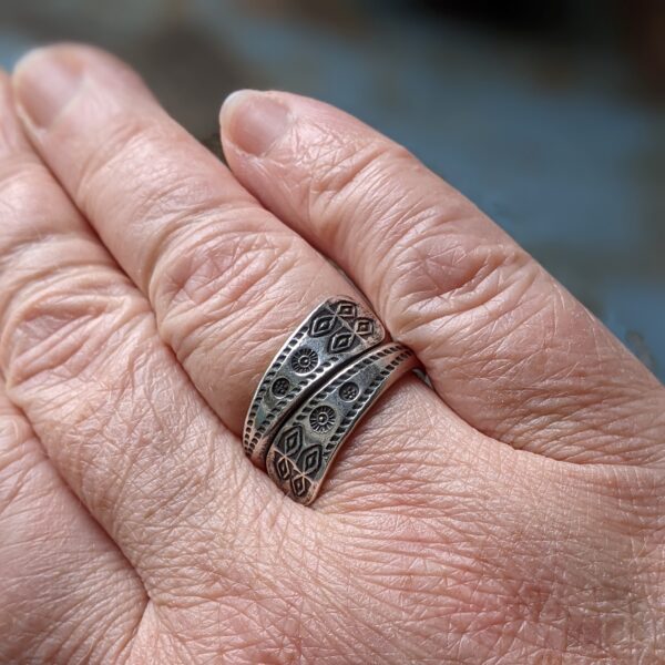 R044 Riff Ring. Wraparound deisign with oxidised geometric trial stamped pattern. Fine silver, Fair Trade, Handmade