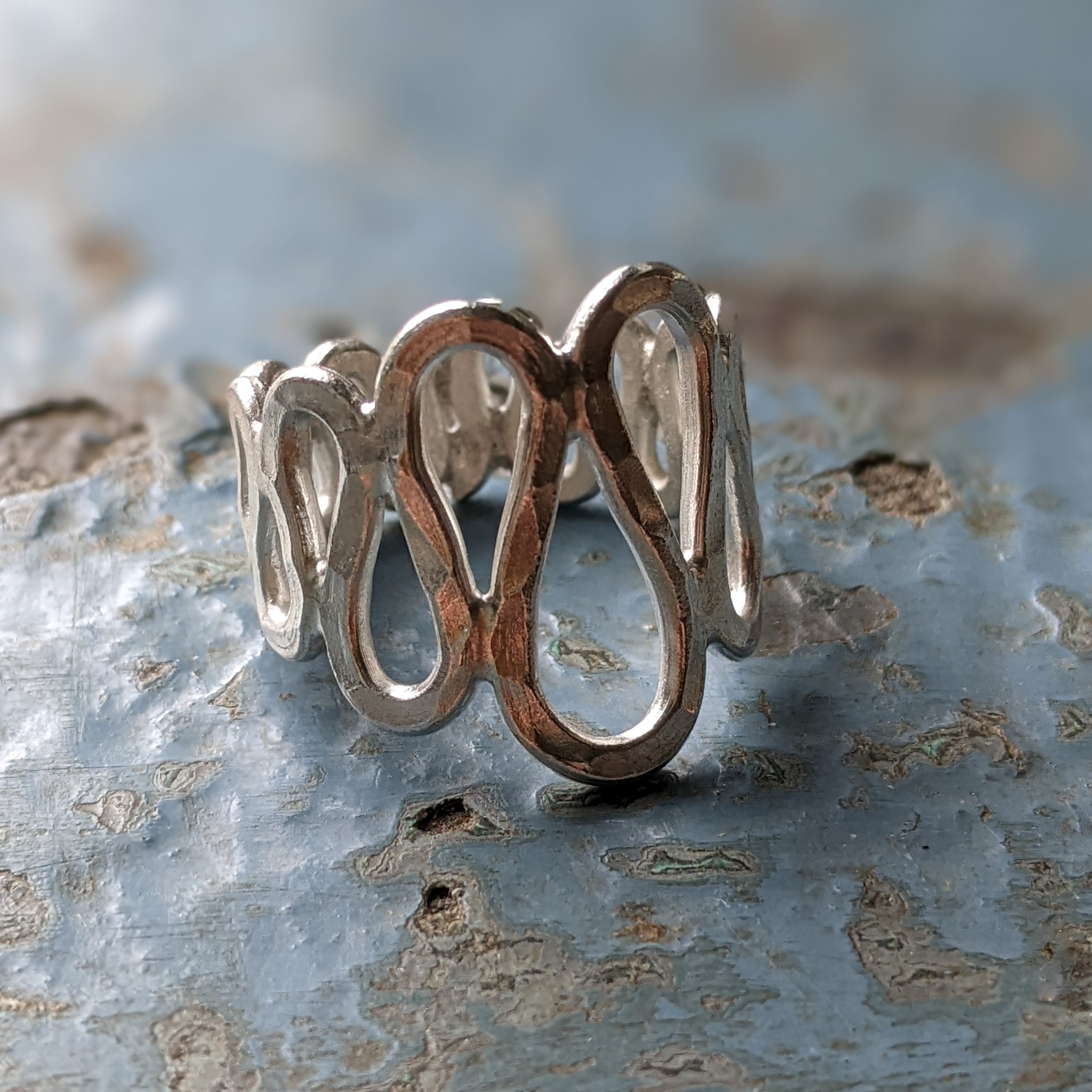 R050 Ryder Ring. Statement ring with a hammered finish and loop shape design
