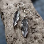 E188 Nora Feather Earrings. Long dangle drop feather shaped earrings. Fine silver, handmade, Fair Trade