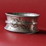 R054 Ragna Spinner Ring. Tribal stamped ring with a central hammered finish spinning ring. Recycled silver, handmade.