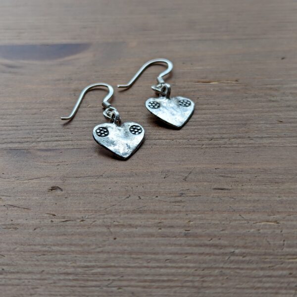 E090 Margo Heart Earrings. Heart shaped dangle drop earrings, handcrafted in recycled fine silver. Fair Trade