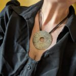 HL744 Eos Pendant Necklace. Large disc pendant strung on a tough nylon cord with silver clasp. Chain, clasp and pendant are all handcrafted from recycled fine silver. Ethically made. Fair Trade.