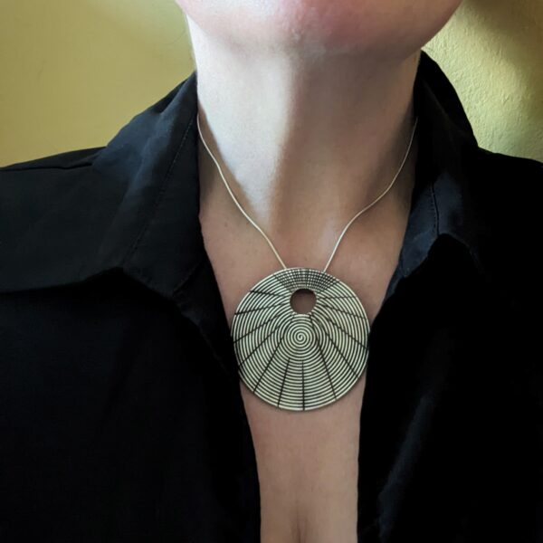 HL752 Juno Pendant Necklace. Statement necklace with a fine silver disc pendant with oxidised spiral patterning. Fair Trade, ethically made.