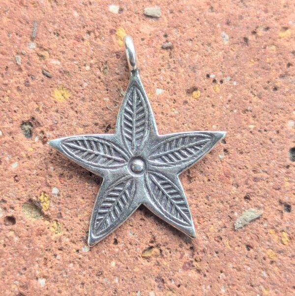 P078 Hoshi Star Pendant. Star shaped pendant with oxidised stamped detailing. Fair Trade, recycled fine silver. Ethically handcrafted. A choice of necklaces are available