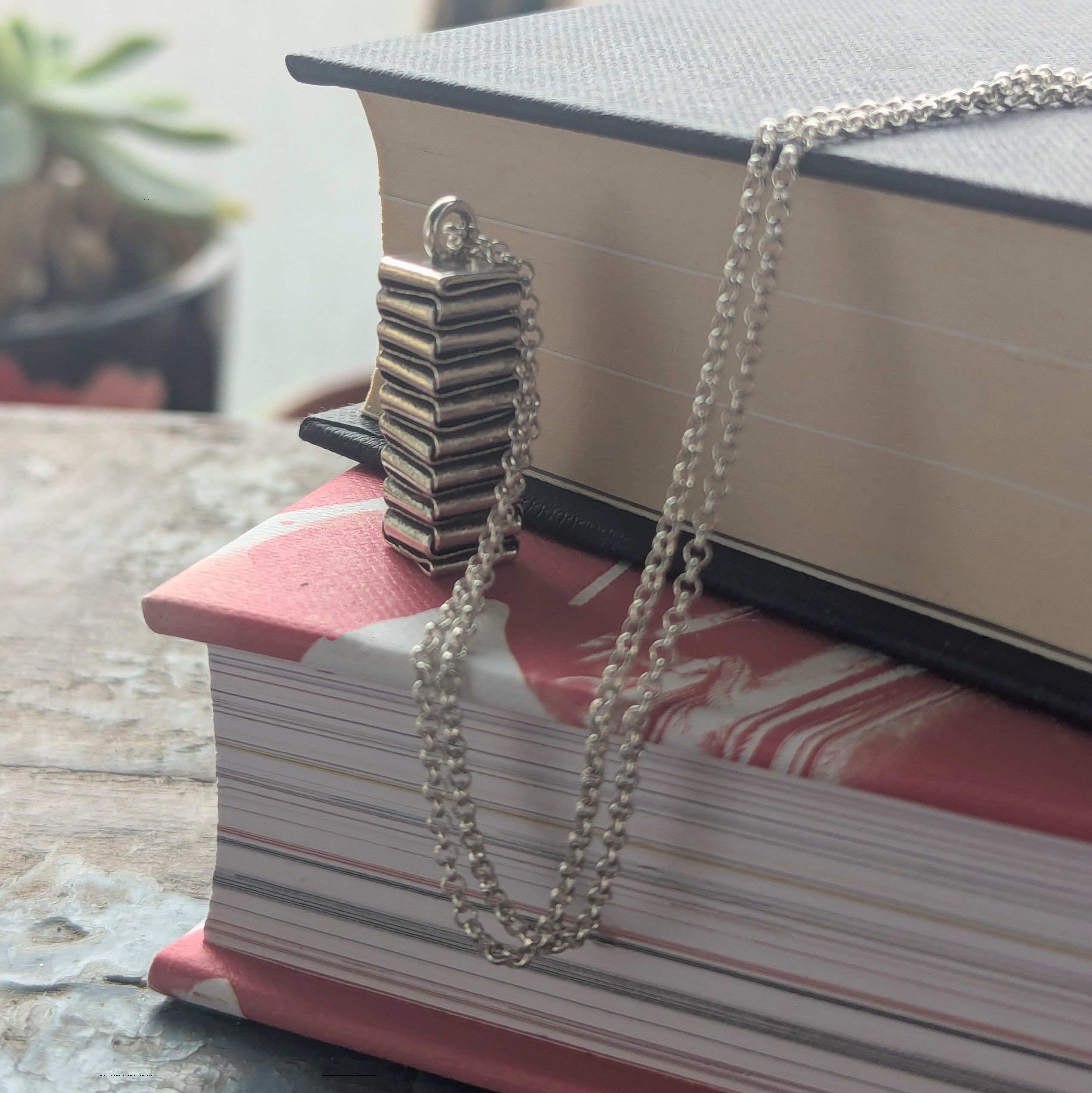 P097 Hope Pendant. A statement pendant created by the craft of origami with folded fine silver. Ethically handcrafted from recycled fine silver. Fair Trade. A choice of necklaces are available