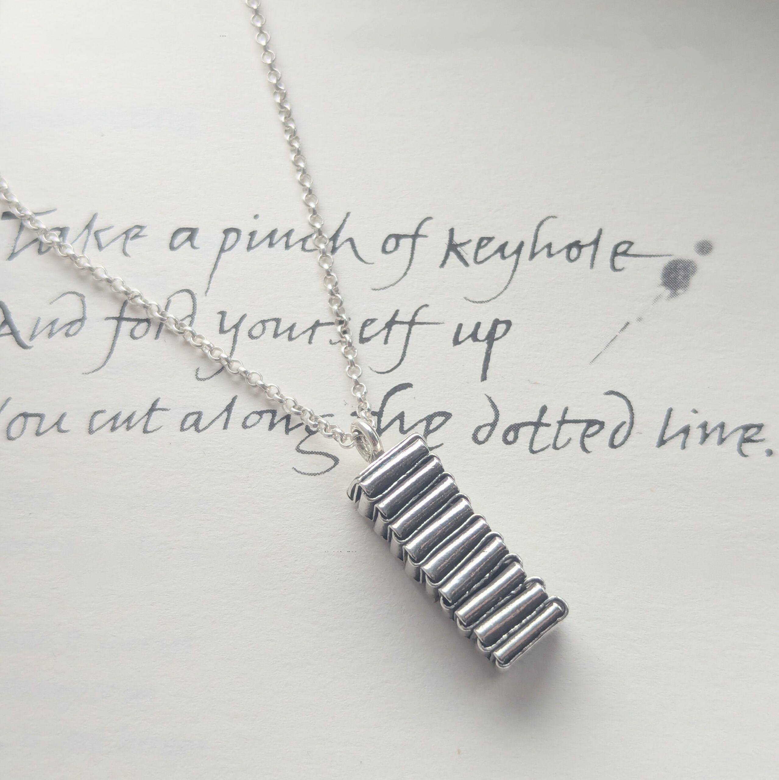 P097 Hope Pendant. A statement pendant created by the craft of origami with folded fine silver. Ethically handcrafted from recycled fine silver. Fair Trade. A choice of necklaces are available