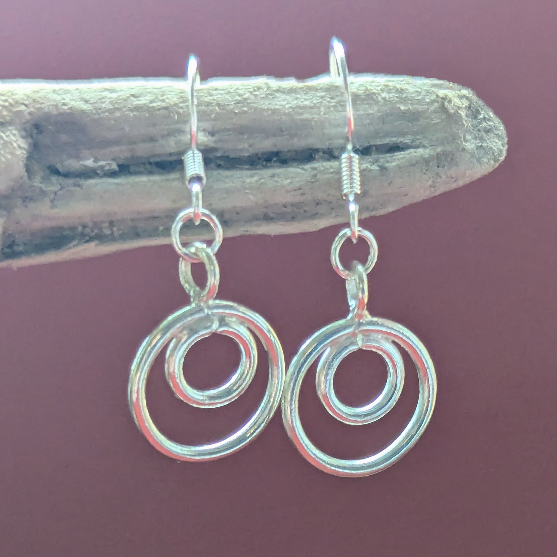E206 Tamara Earrings. Double hoop dangle drops. Handmade from recycled fine silver and Fair Trade.