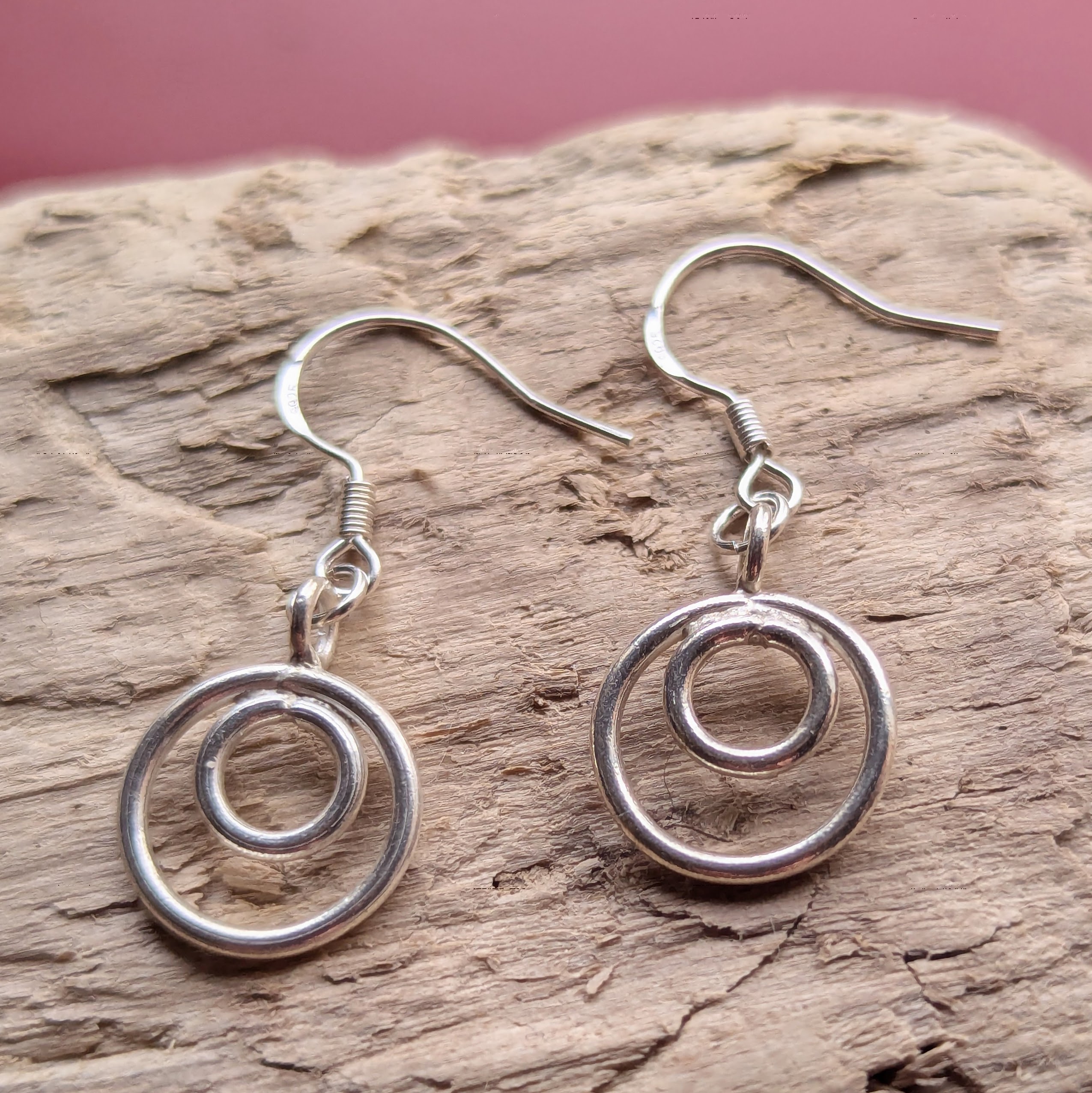 E206 Tamara Earrings. Double hoop dangle drops. Handmade from recycled fine silver and Fair Trade.