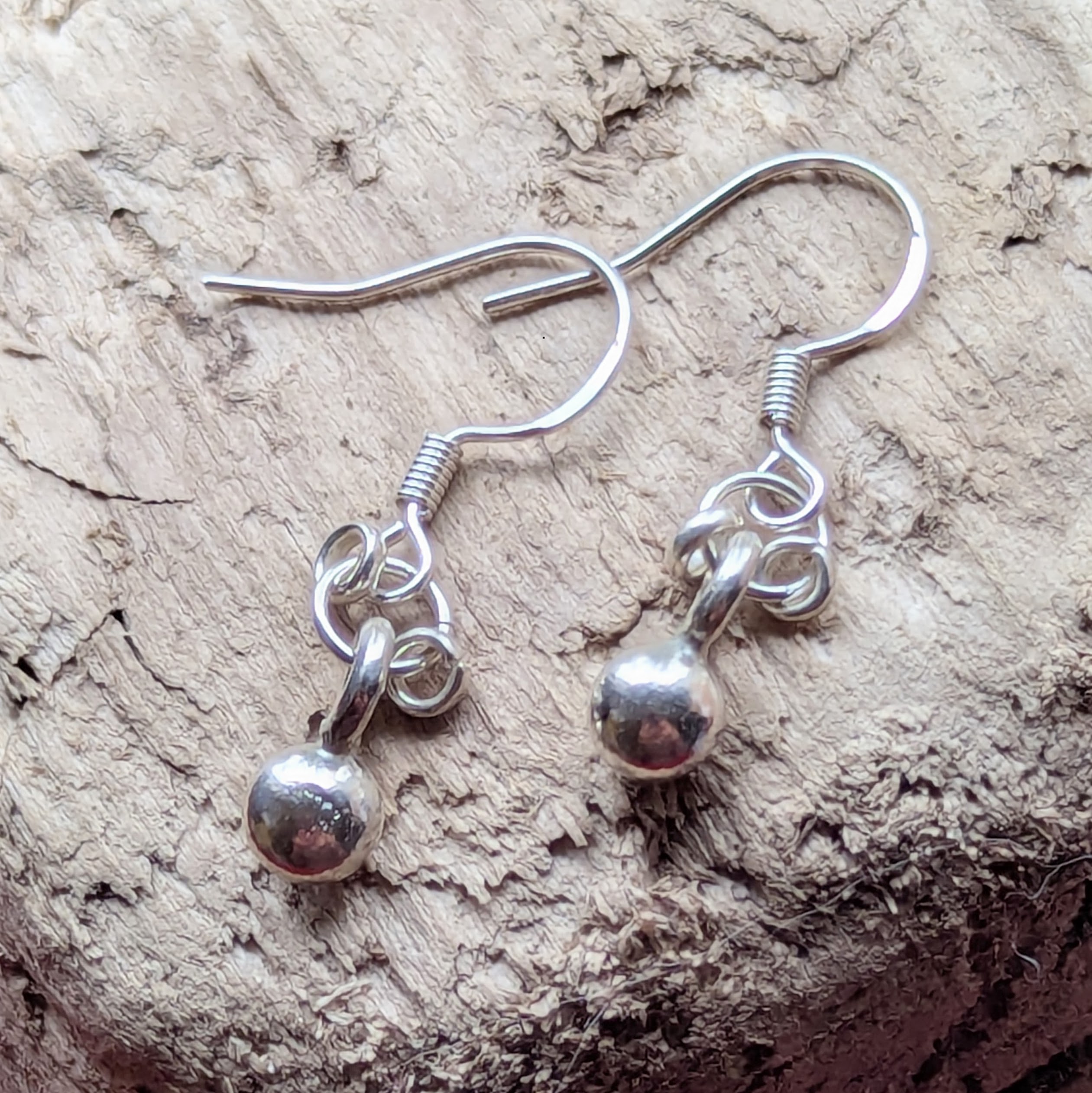 E207 Adriana Earrings. Tiny dangle drop ball earrings. Spiral dangle drops. Handmade from recycled fine silver and Fair Trade.