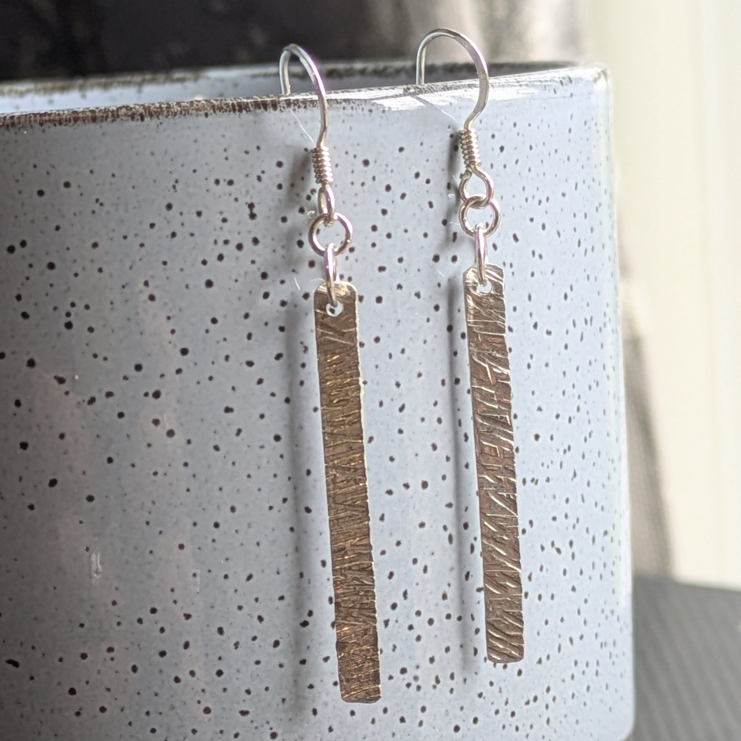 E220 Bronte Earrings. Long elegant rectangular dangle drop earrings. Created from recycled silver and made in Cheshire, UK