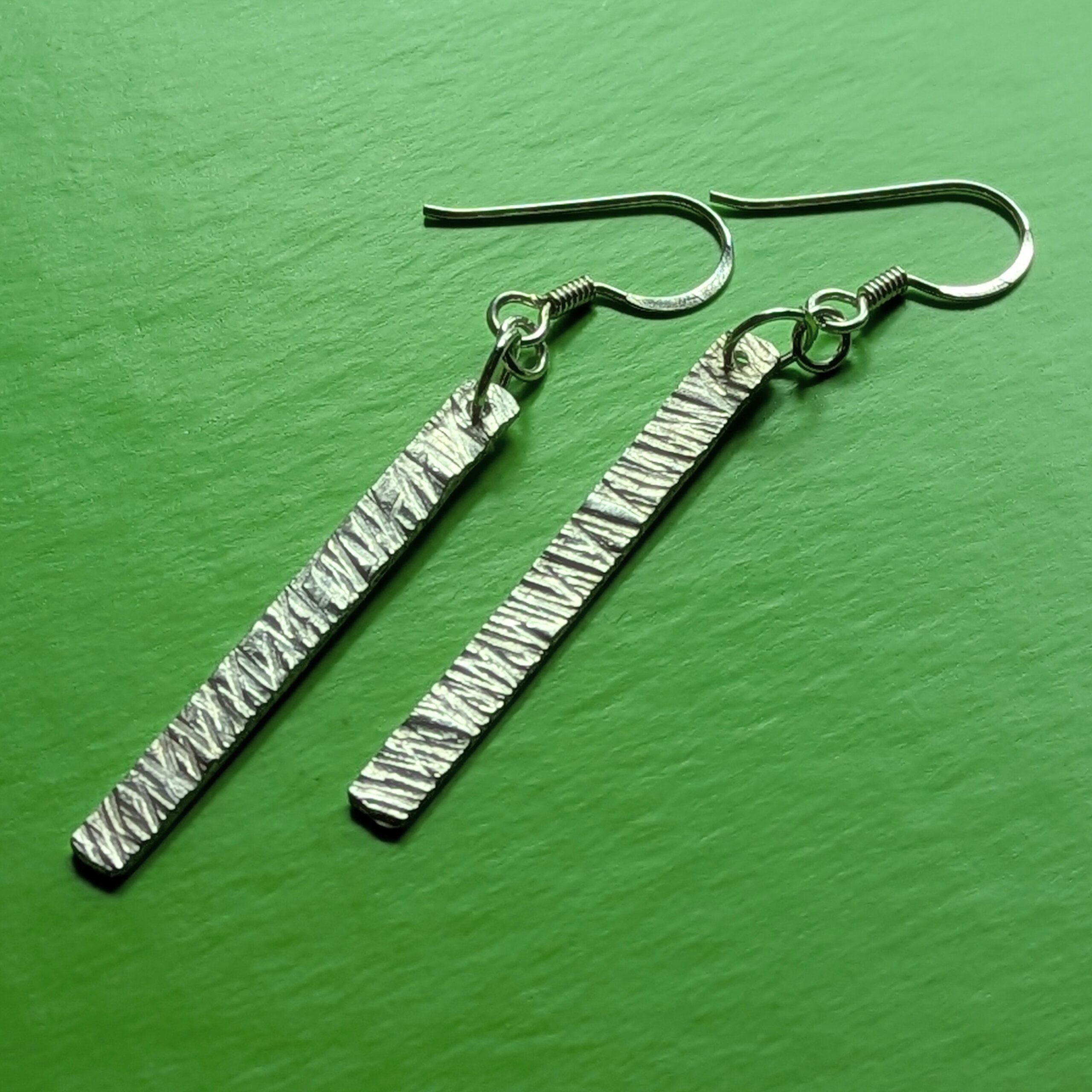E220 Bronte Earrings. Long elegant rectangular dangle drop earrings. Created from recycled silver and made in Cheshire, UK