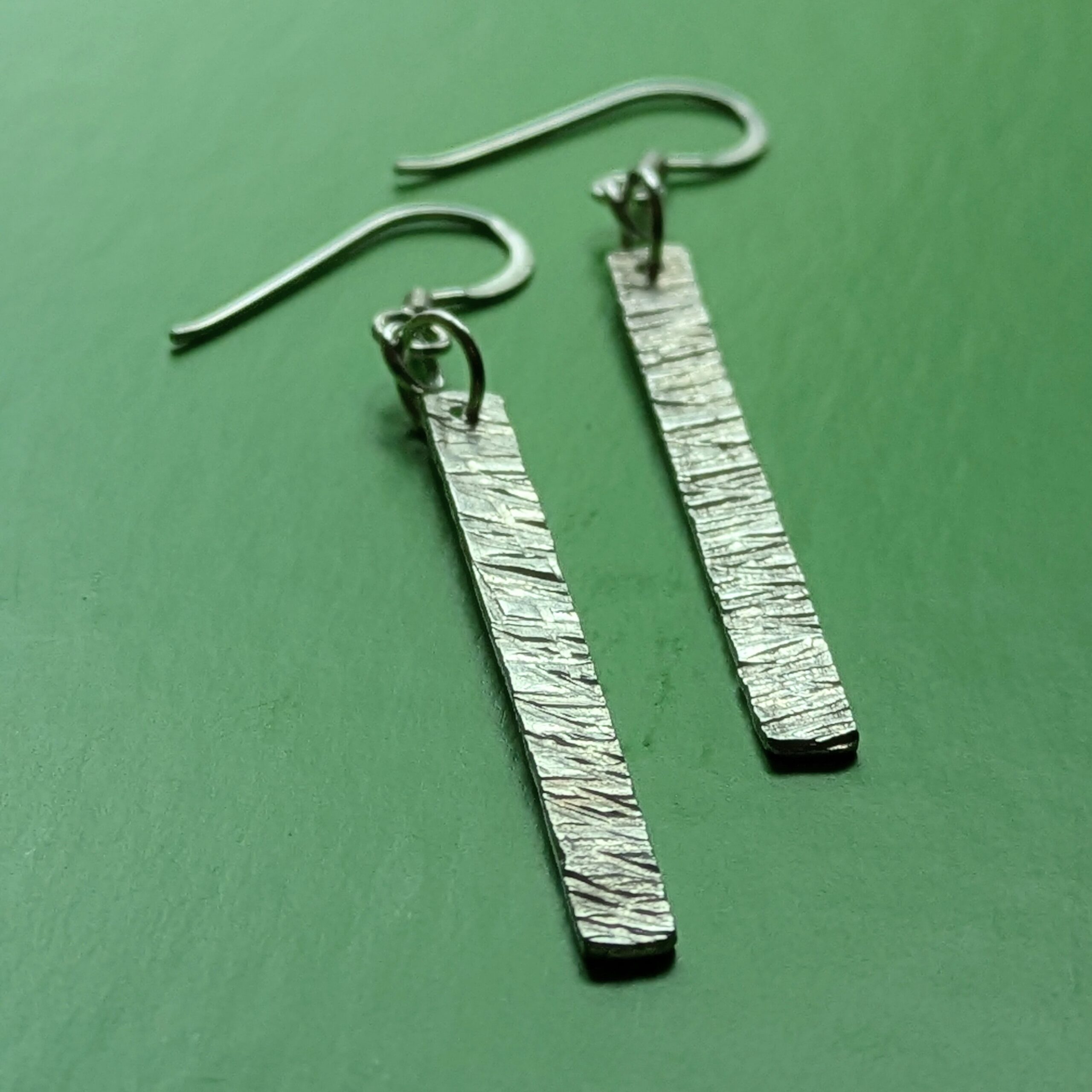 E220 Bronte Earrings. Long elegant rectangular dangle drop earrings. Created from recycled silver and made in Cheshire, UK