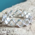 R070 Reef Ring. A double wavy ring, inspired by water ripples. Handcrafted by Karen Hill Tribe artisan silversmiths. Fair Trade