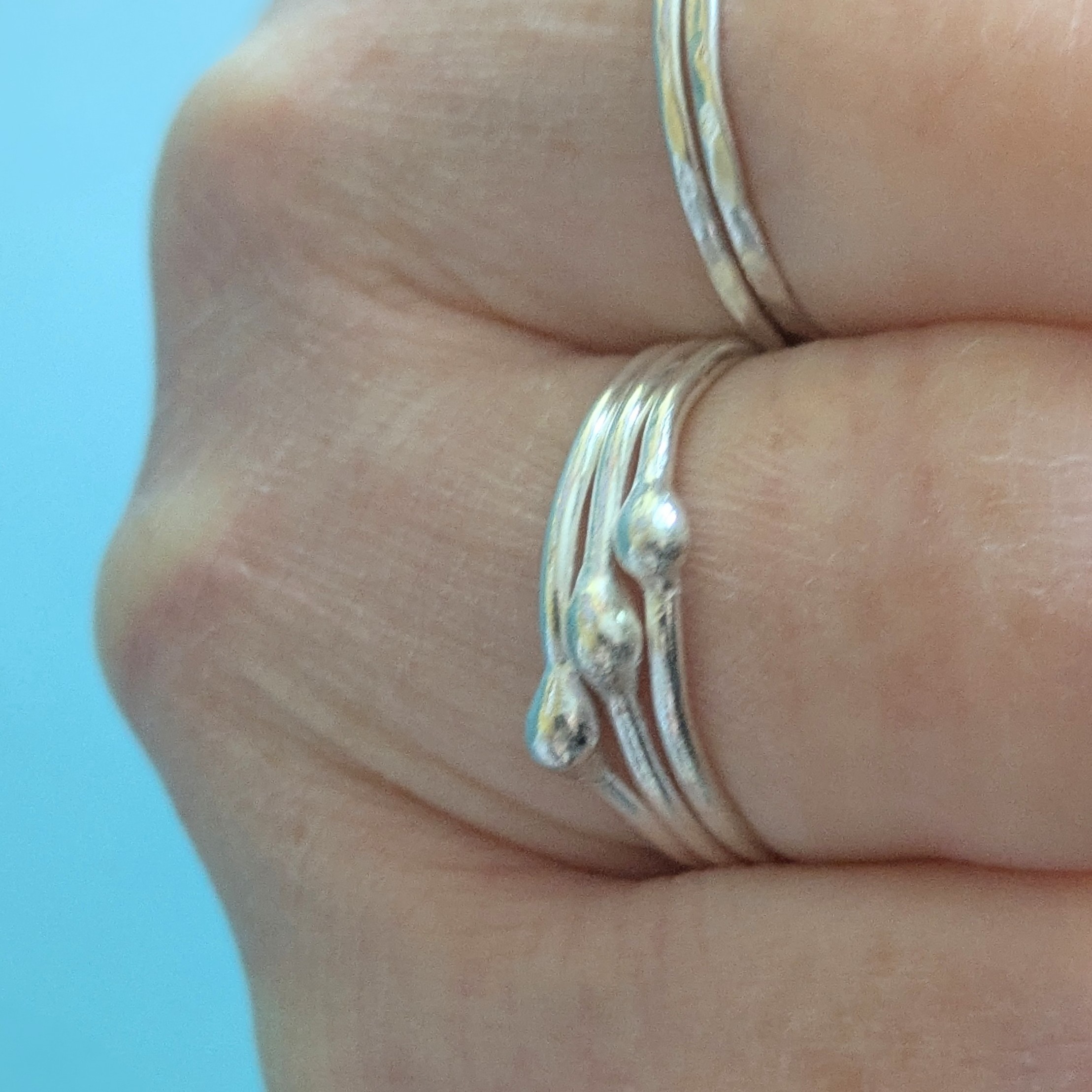 R071 Robbie Ring. A triple band ring with central detailing. Fine silver. Fair Trade