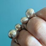 R072 R073 Raven Ring. Statement silver ring with two central balls. Brushed and polished finishes. Fair Trade, Handmade