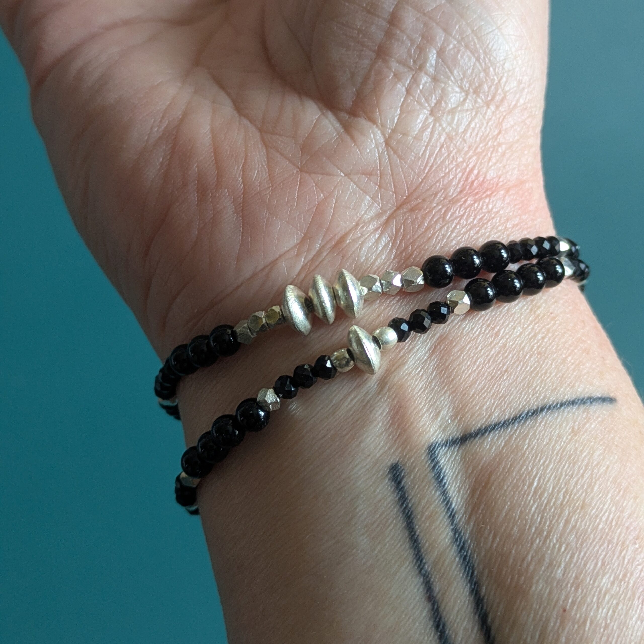 BR085 Twilight Bracelet and BR086 Noctis Bracelet- Black onyx and Fair Trade recycled silver beaded bracelet.