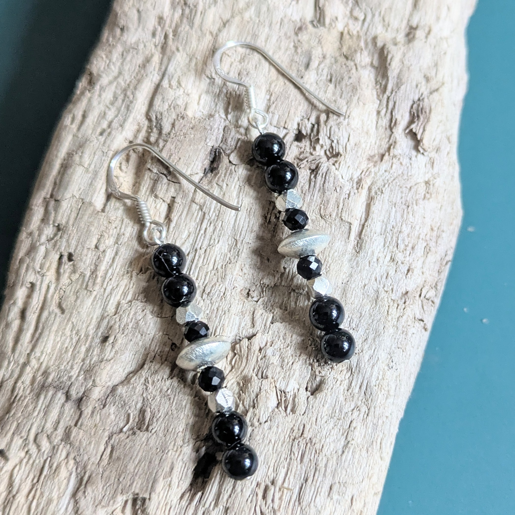 E225 Twilight Earrings - Dangle drop earrings of black onyx and Fair Trade silver beads. Handcrafted in Thailand and the UK.