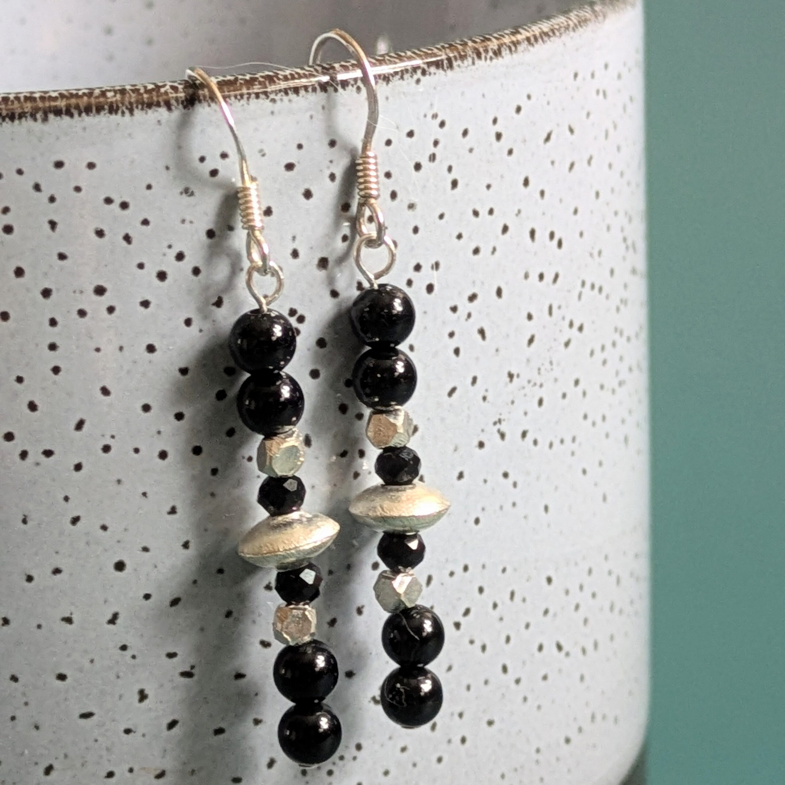 E225 Twilight Earrings - Dangle drop earrings of black onyx and Fair Trade silver beads. Handcrafted in Thailand and the UK.