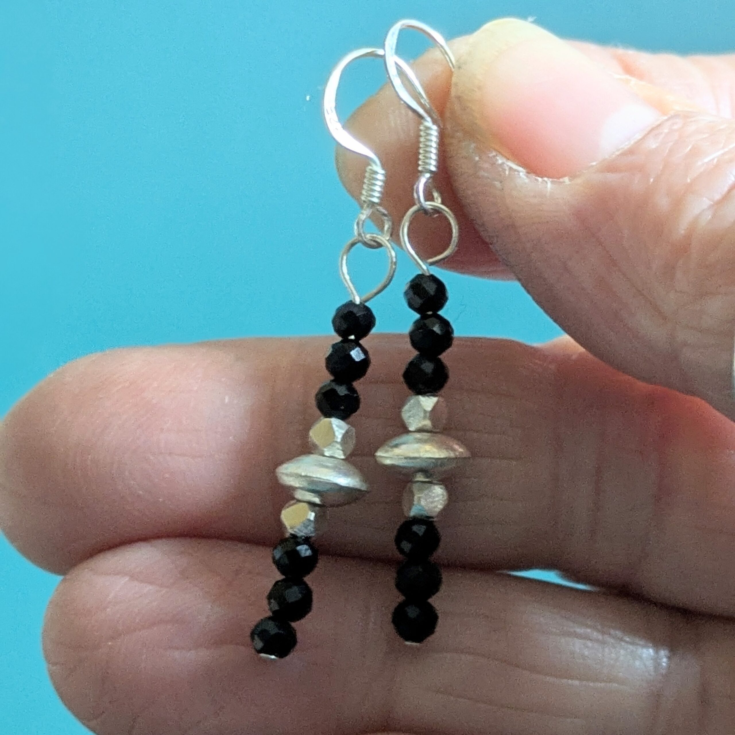 E226 Shadow Earrings - Dangle drop earrings of black onyx and Fair Trade silver beads. Handcrafted in Thailand and the UK.