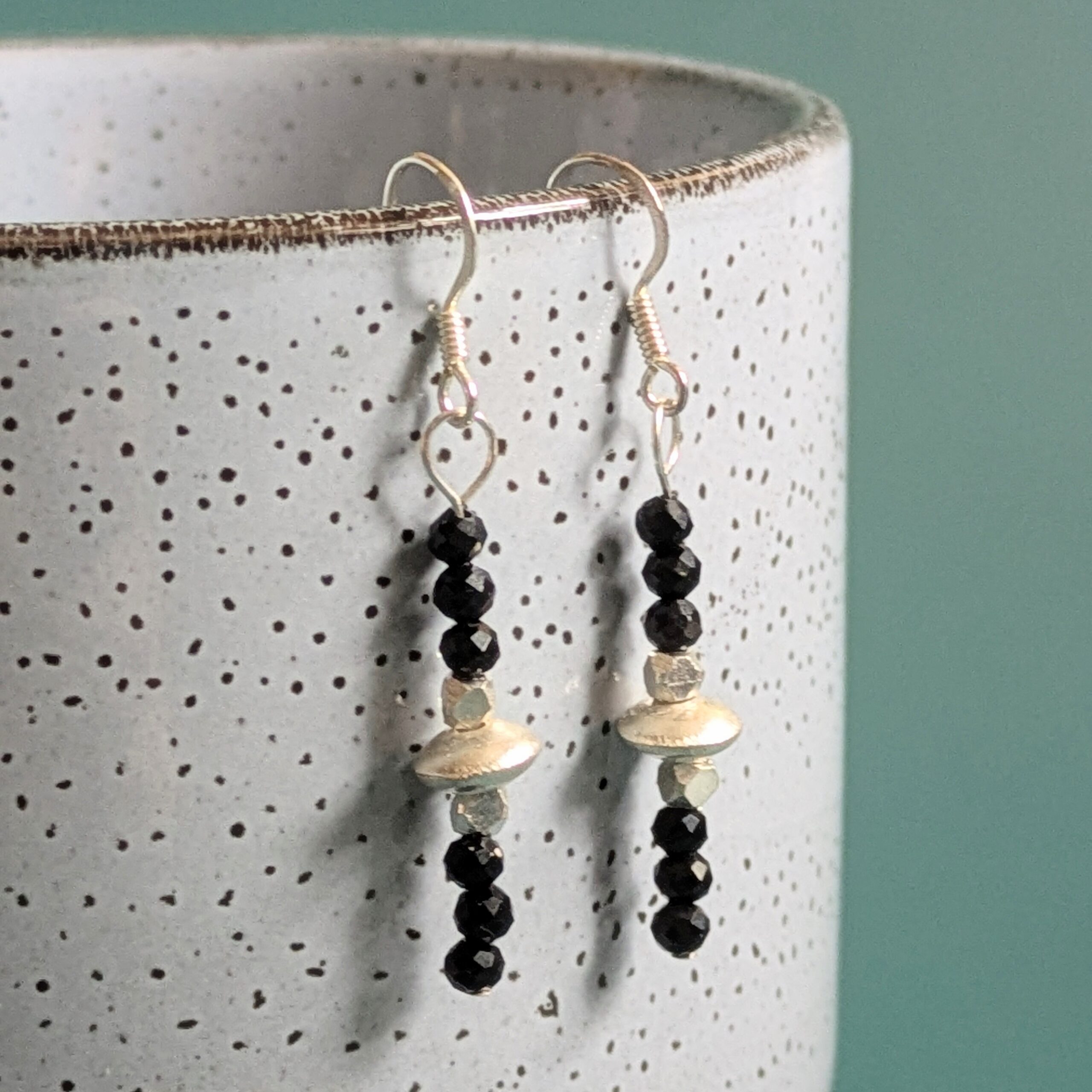 E226 Shadow Earrings - Dangle drop earrings of black onyx and Fair Trade silver beads. Handcrafted in Thailand and the UK.