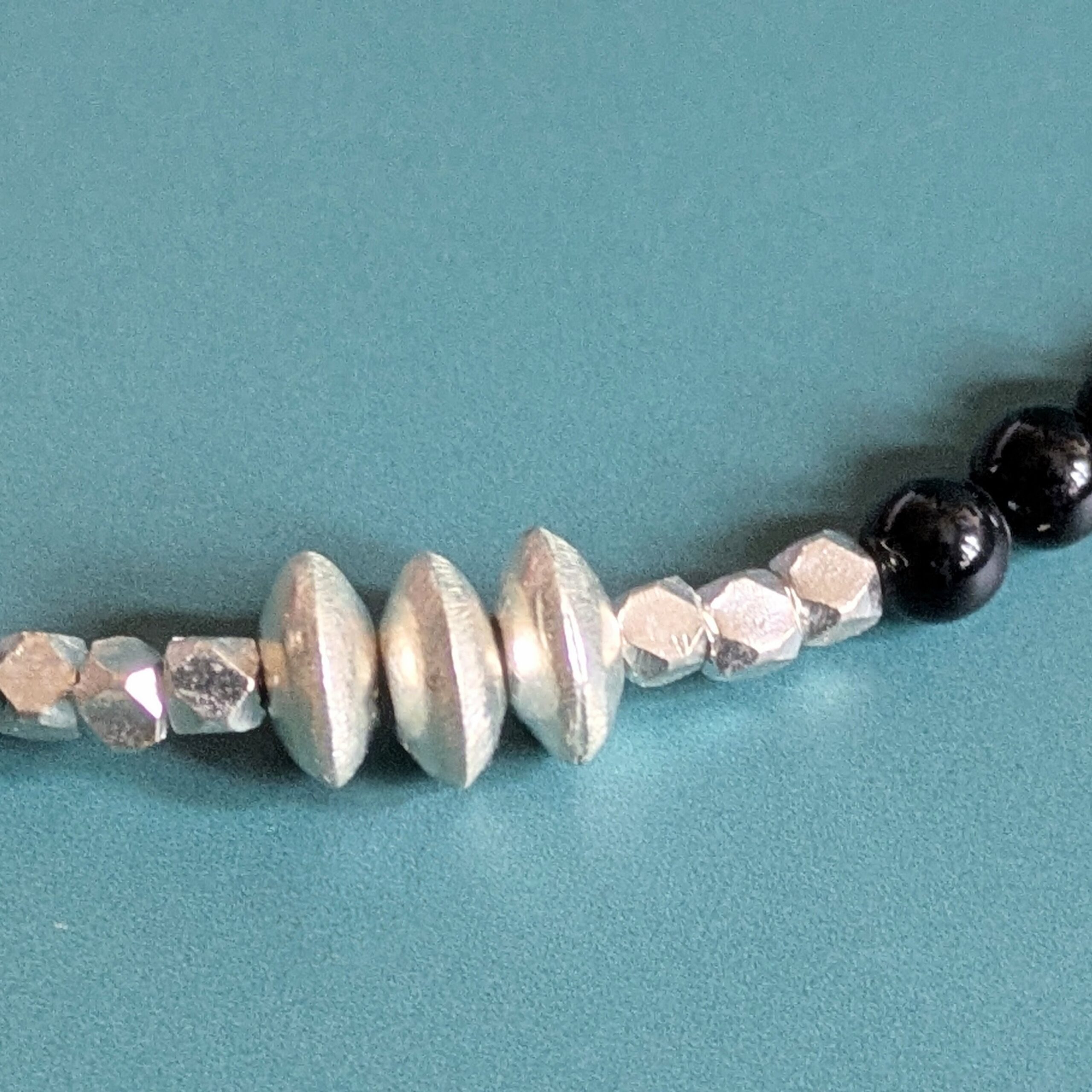 N131 Noctis Necklace - Black onyx and Fair Trade recycled silver beaded necklace. Modern Gothic aesthetic.