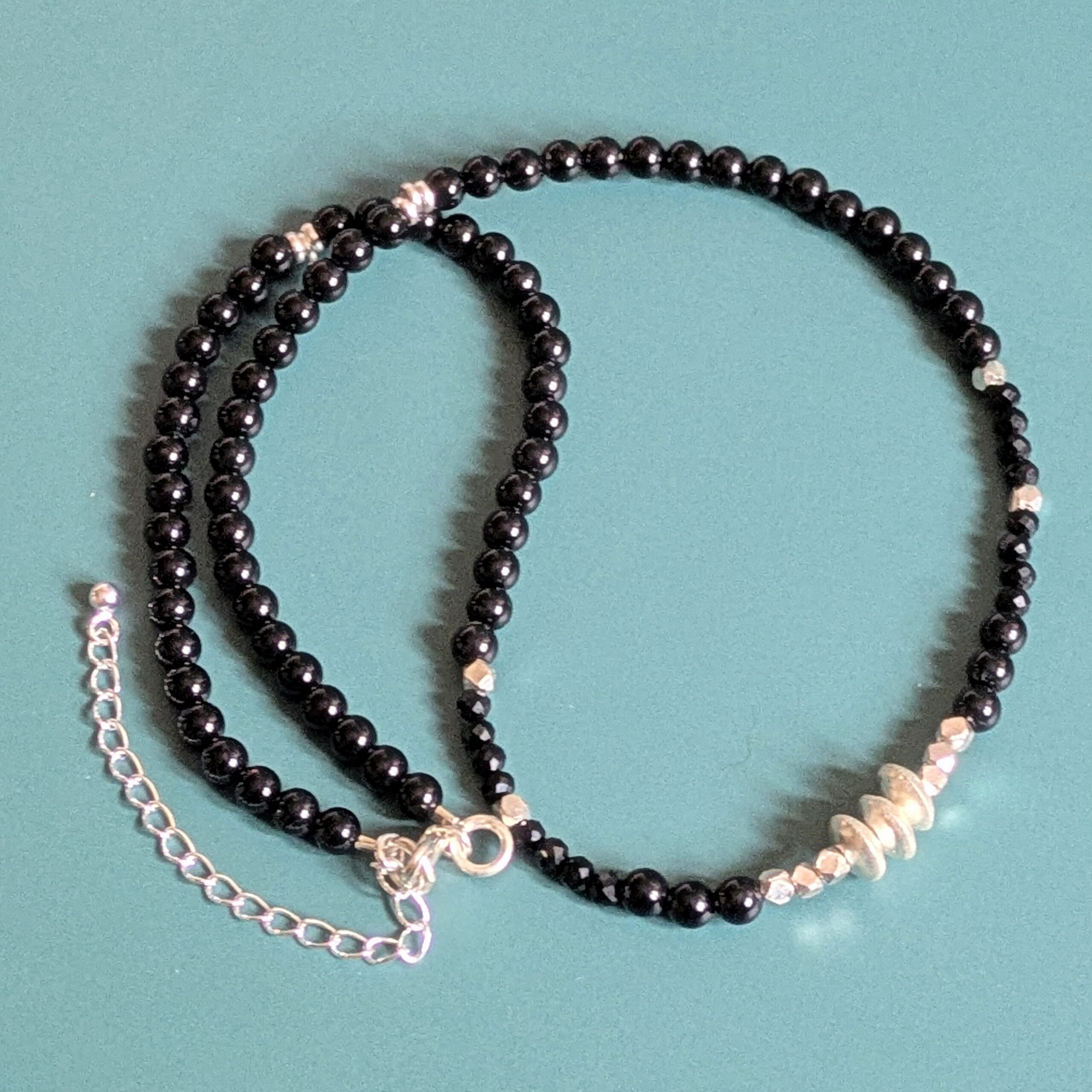 N131 Noctis Necklace - Black onyx and Fair Trade recycled silver beaded necklace. Modern Gothic aesthetic.