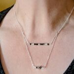 N132 Renfri Necklace - a multi chain drapped necklace with fair trade recycled silver and black onyx beads. Modern gothic.